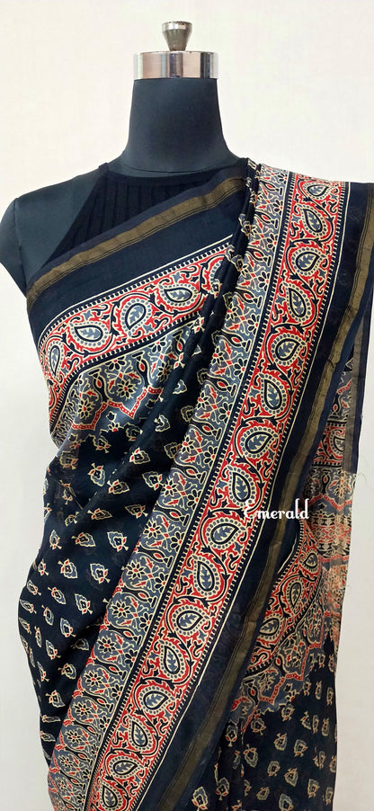 An ancient craft, the history of the Ajrakh can be traced back to the civilizations of the Indus Valley that existed around 2500 BC-1500 BC. Here we have a stunning black screen printed Ajrakh on handwoven Chanderi. Mix and match with our khun blouses for creating unique ensembles.