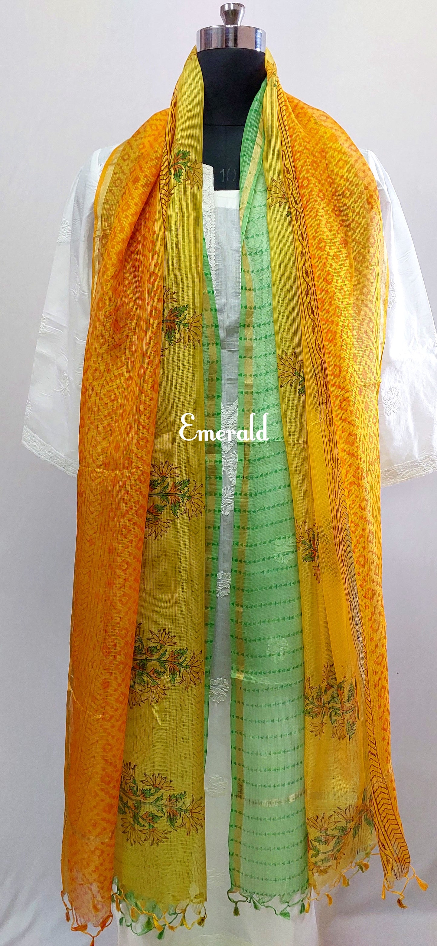 A beautiful, super light weight, hand printed kota silk Dupatta. Shaded orange and green with hand printed floral designs. Has a beautiful thin golden border, makes it a great accessory for occasion wear.
Dupatta length-2.5m
Dupatta width-35.5in
Wash care- Dry Clean only.