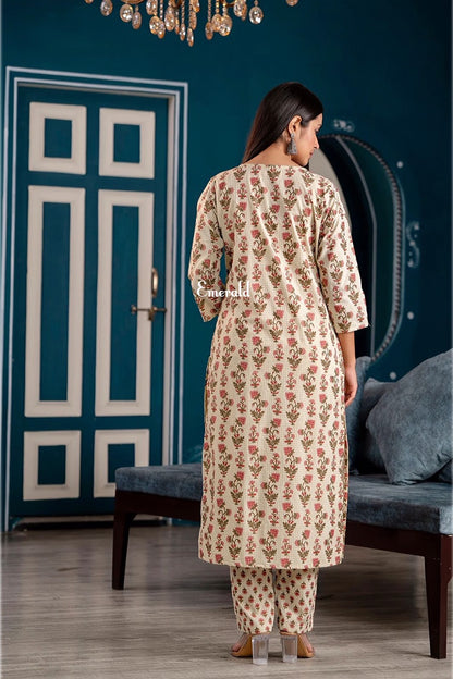 A casual cotton, cream, red and green, floral printed kurta with light sequins work embroidery in the front. Comes with matching printed ankle length pants. Perfect for Summers! Wash Care- machine washable.