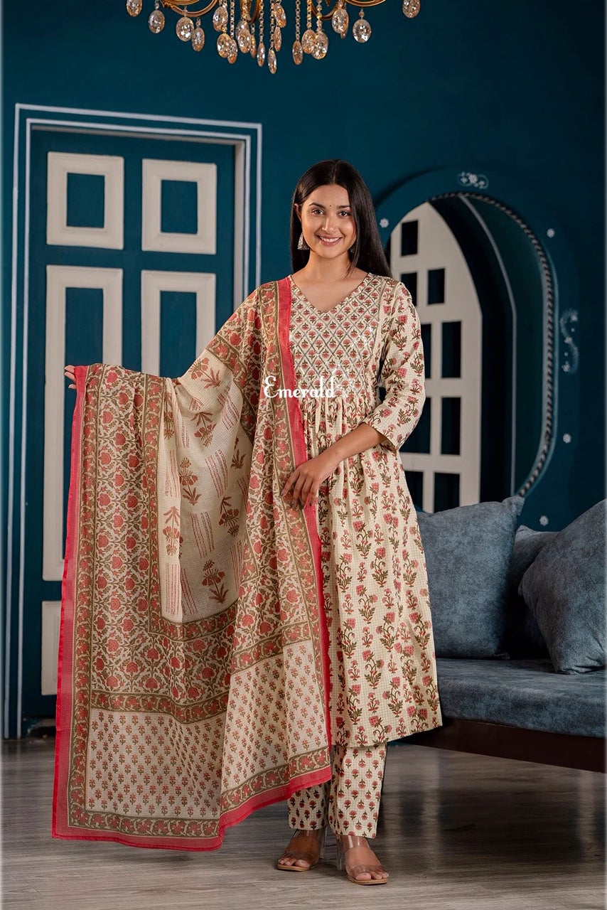 A casual cotton, cream, red and green, floral printed kurta with light sequins work embroidery in the front. Comes with matching printed ankle length pants. Perfect for Summers! Wash Care- machine washable.