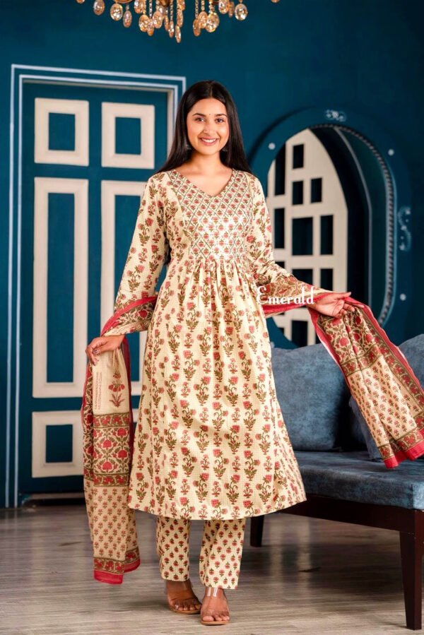 A casual cotton, cream, red and green, floral printed kurta with light sequins work embroidery in the front. Comes with matching printed ankle length pants. Perfect for Summers! Wash Care- machine washable.